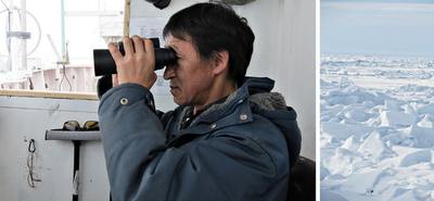 Depuis son point d'observation sur le NGCC Louis S. St.-Laurent, Nelson Ruben balaie du regard l'horizon afin de déceler des signes de la présence de mammifères marins