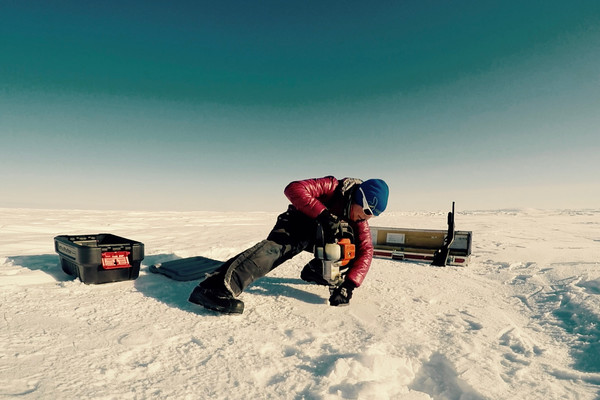 We use a special power head that assists ice core scientists in drilling shallow cores.