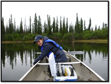  Kimberley collecting methane samples from Lake 280. The main focus of their research consists of a set of six lakes from The Delta, all of which are accessible by motorboat or canoe.