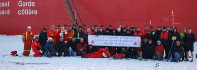 Partial group shot of some of the crew and staff of the Canadian Polar Expedition 2014 at the North Pole
