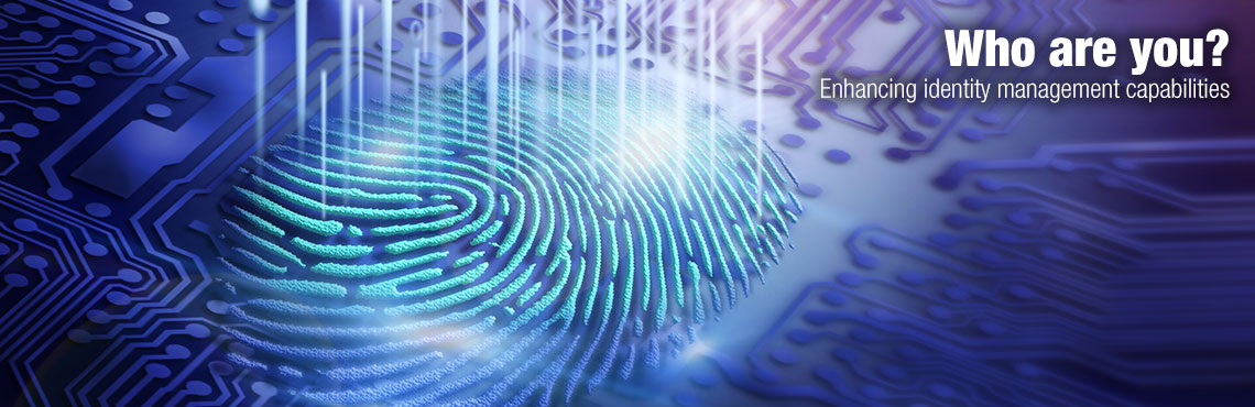A motherboard and digital fingerprint. Text on image: Who are you? Enhancing identity management capabilities.