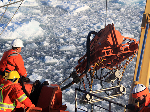 Seismic gear being deployed from the CCGS Louis S. St-Laurent in the Arctic Ocean (2015) – Canadian Coast Guard personnel
